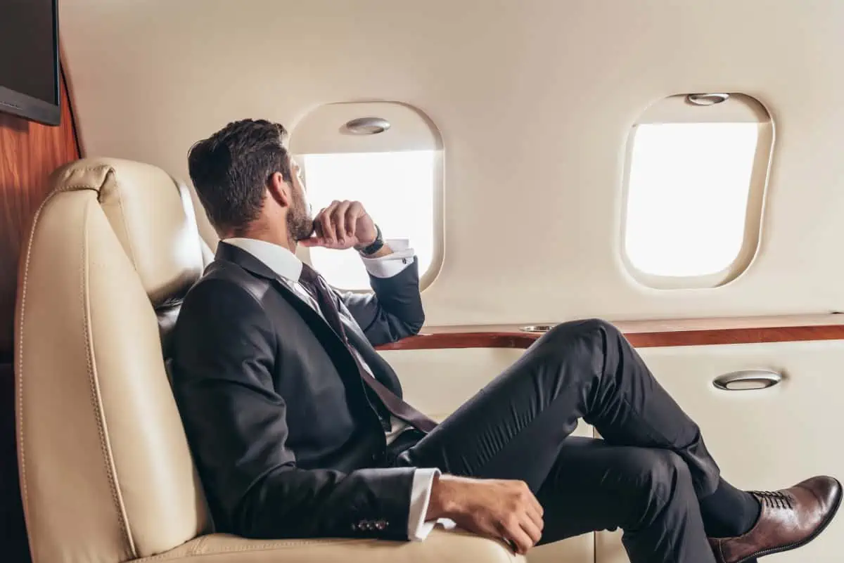 A-Businessman-in-Black-Suit-in-the-Aircraft