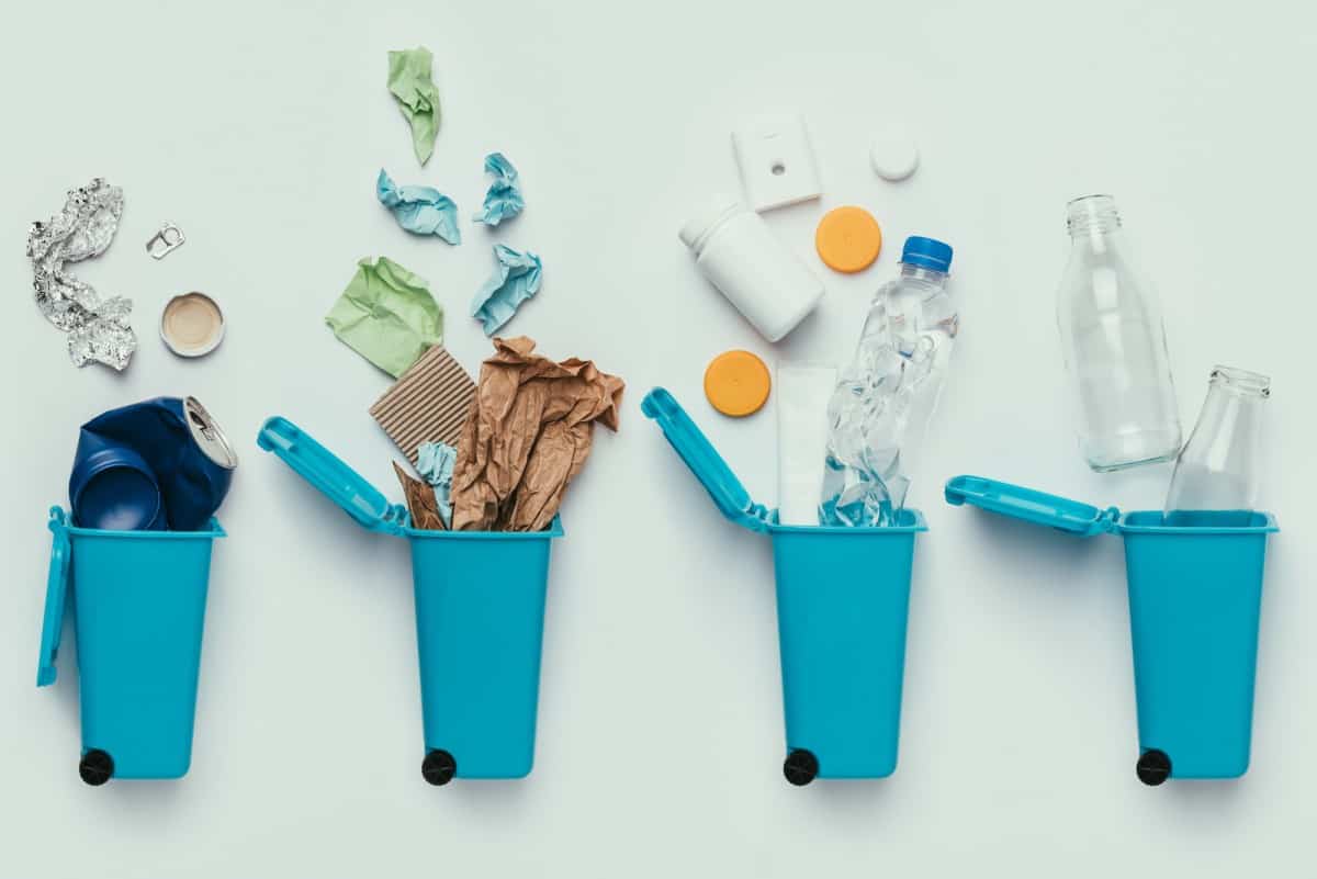Sustainable Travel Statistics - Facts and Trends in 2025 19 Blue-Trash-Bins-and-Assorted-Garbage
