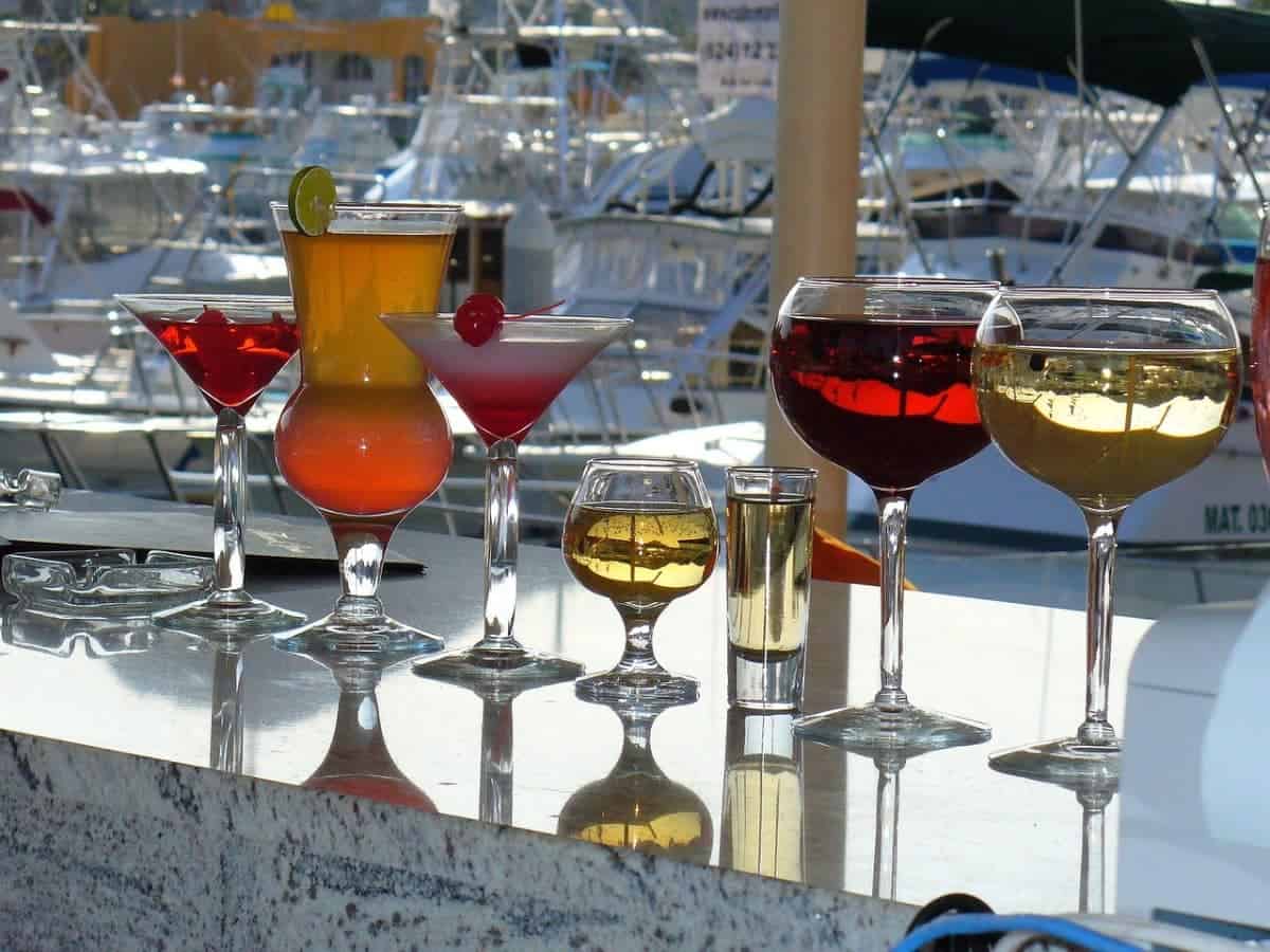 Cabo vs Puerto Vallarta: An Honest Comparison To Help You Choose in 2025 19 Cocktail-Glasses-at-Cabo-San-Lucas-Beach