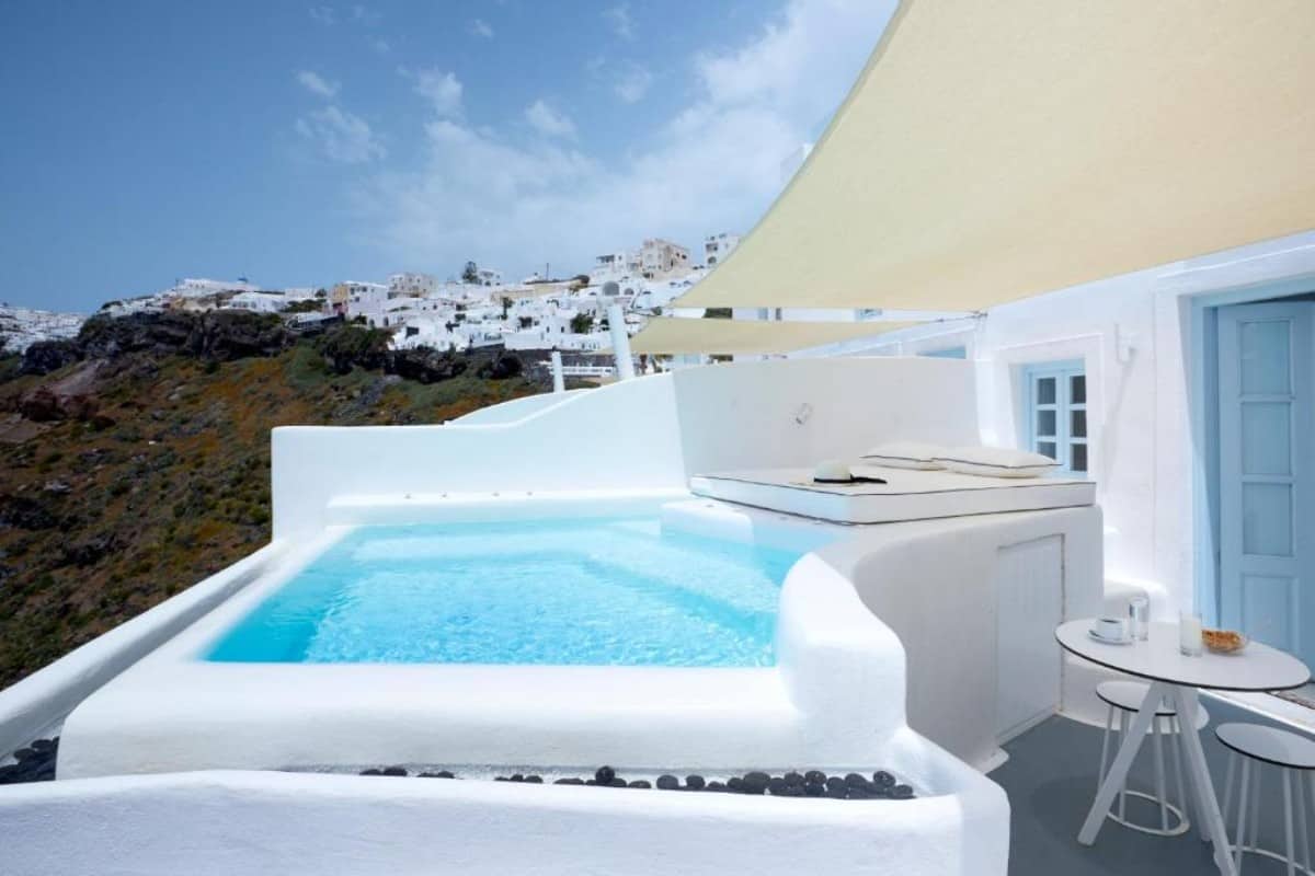 The 16 Best Hotels With Swim Up Rooms in Greece (2025 Guide) 25 Dana-Villas-and-Suites-Santorini