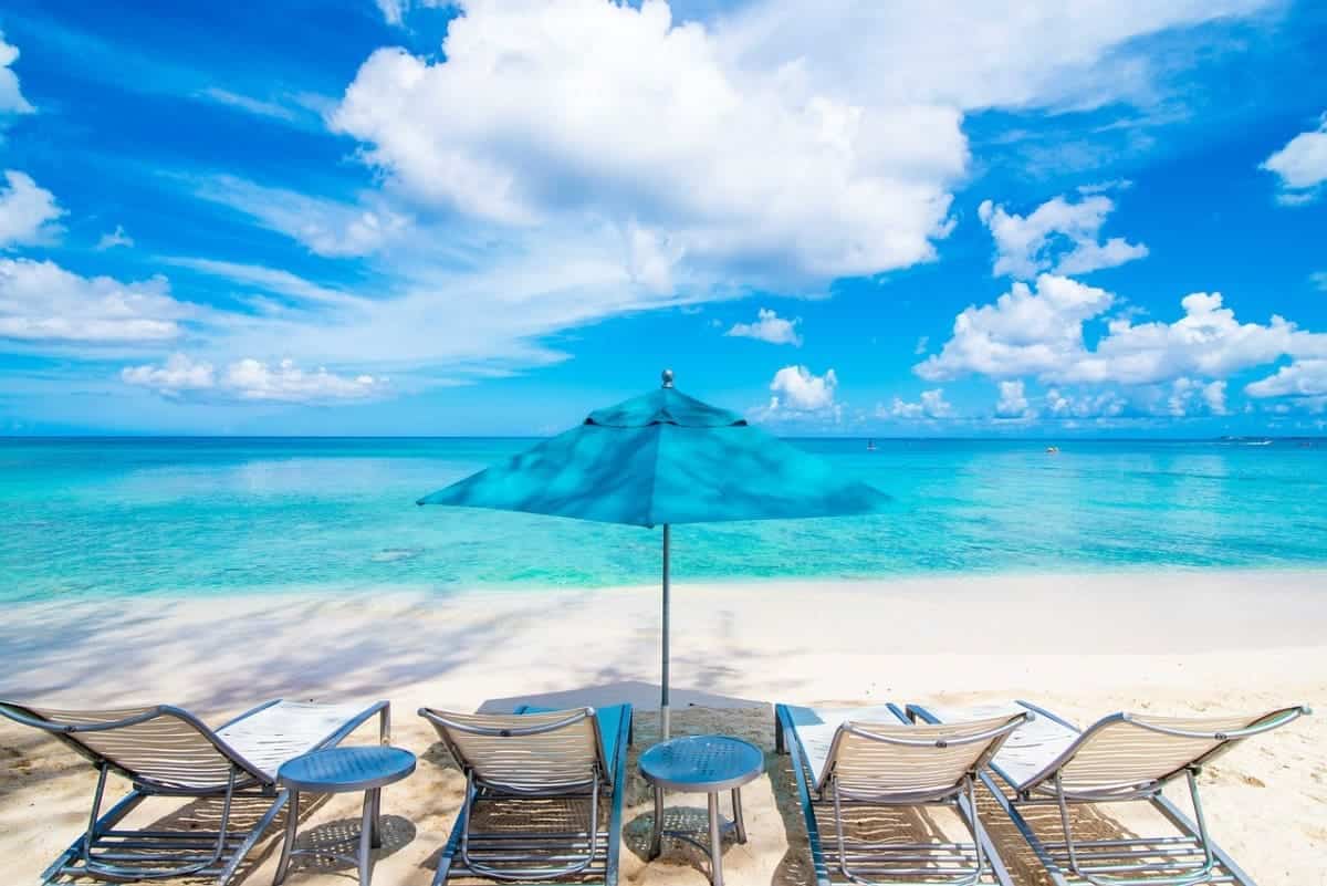 Grand Cayman vs Turks And Caicos - An Honest Comparison in 2025 22 The-Chairs-at-Cayman-Islands-Beach