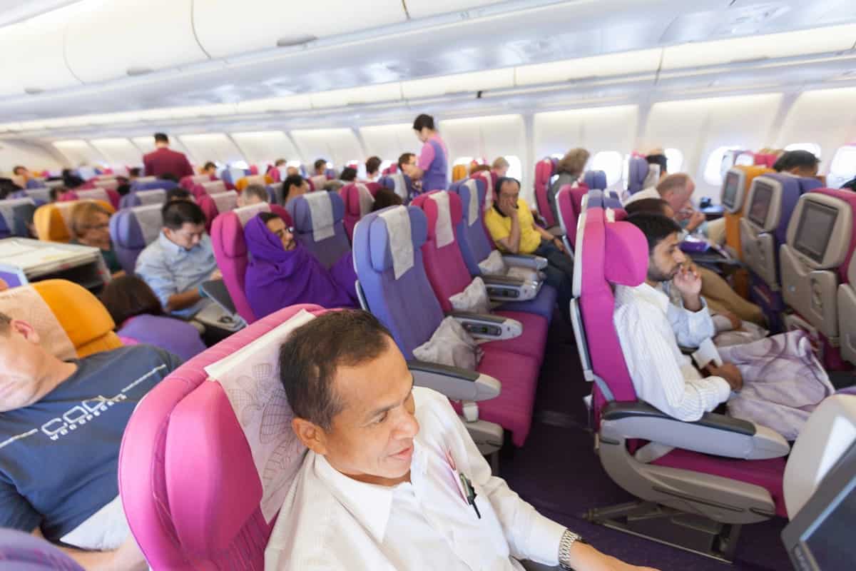 30+ Things To Do on a Plane - On-the-Go Amusements 4 The-Passengers-and-a-Crew-Member-on-the-Plane